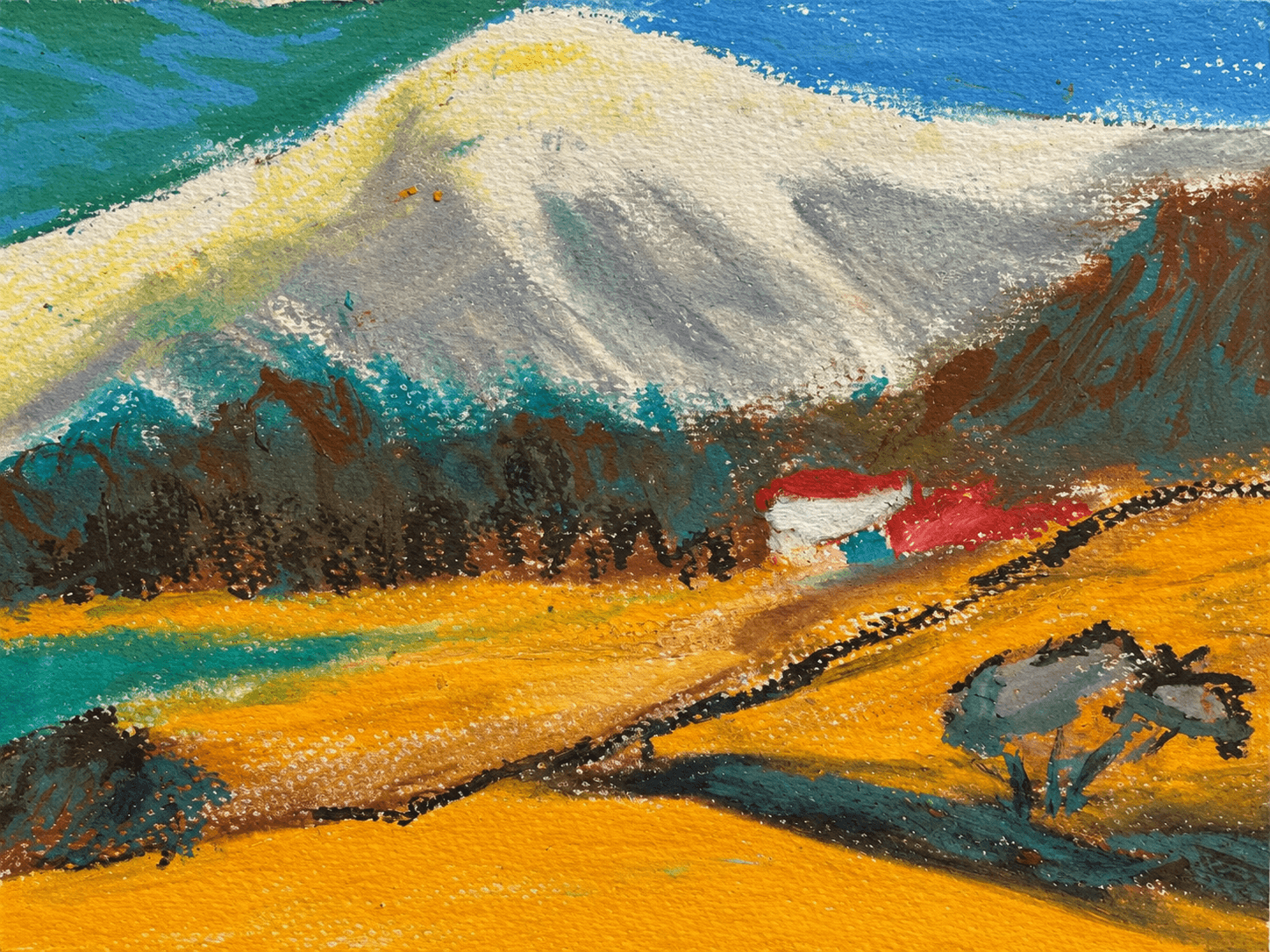 Ochre fields beneath a pale mountain