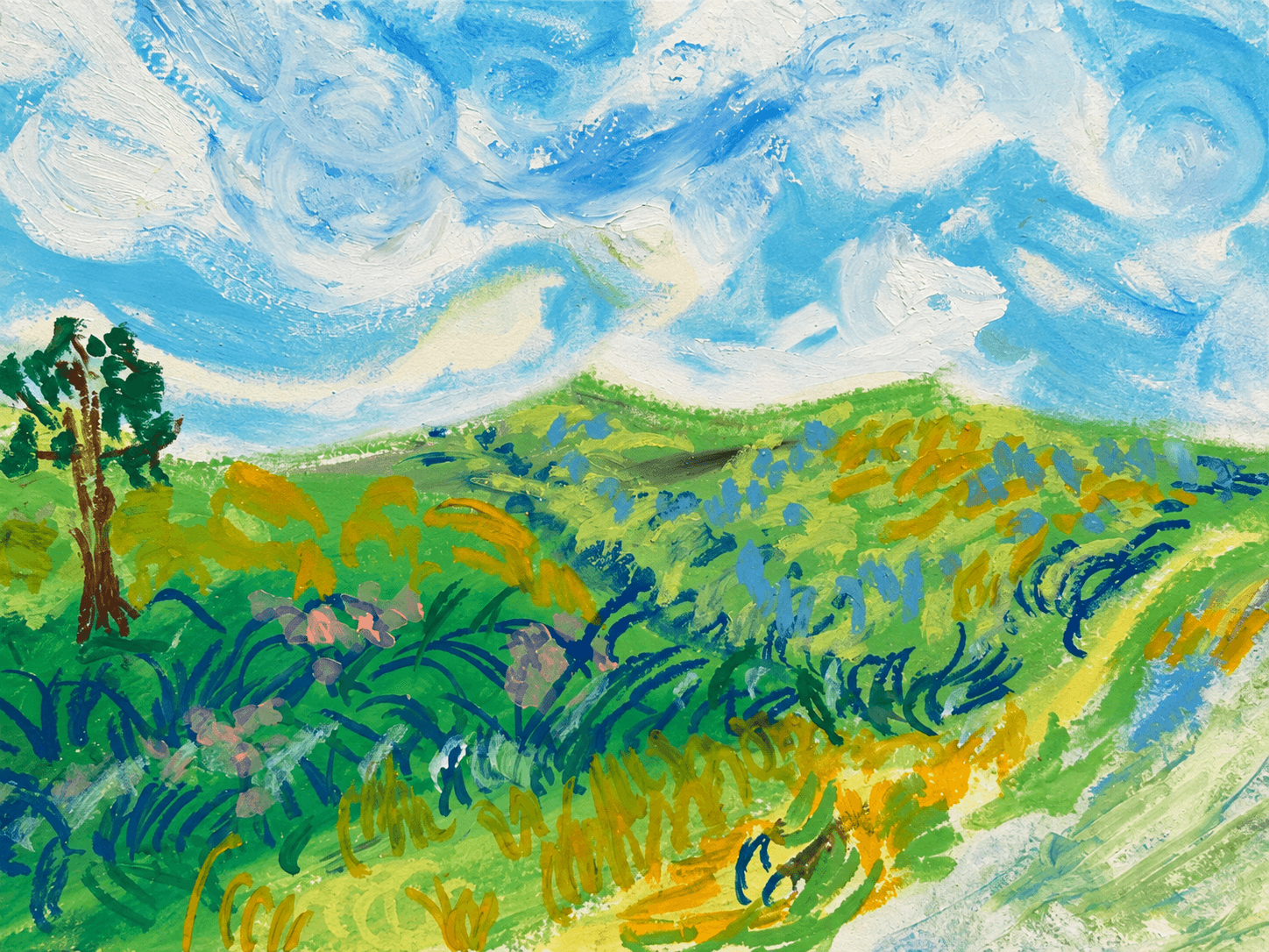 Green hills under clouded sky