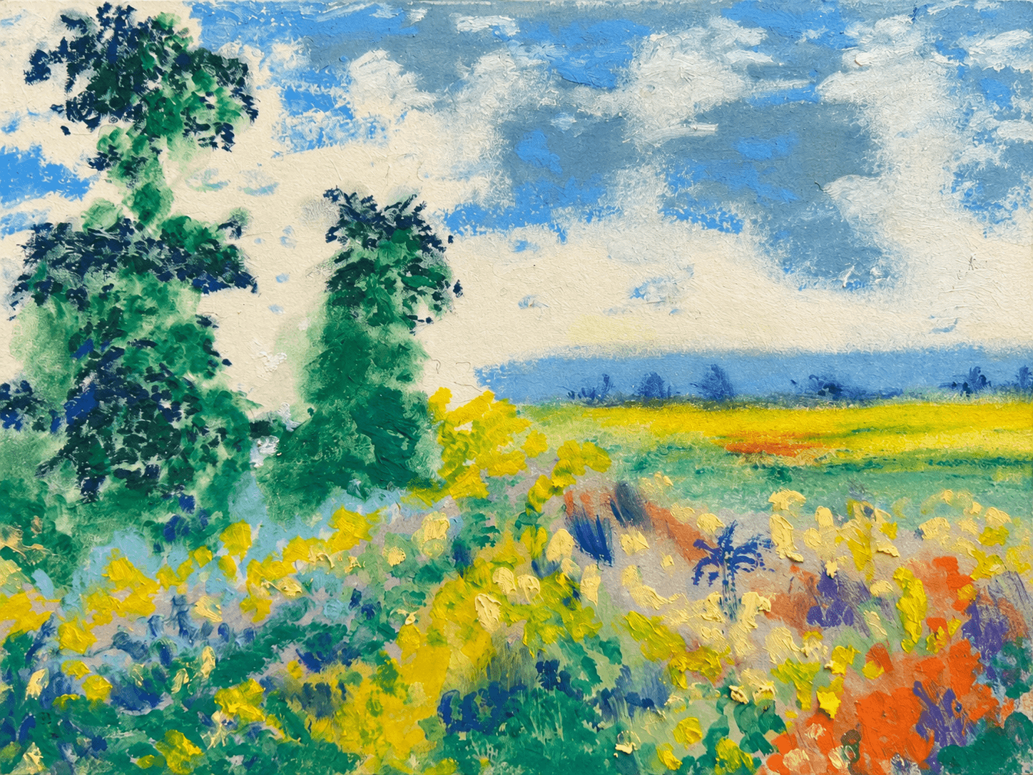 Flowering meadow with trees and distant horizon