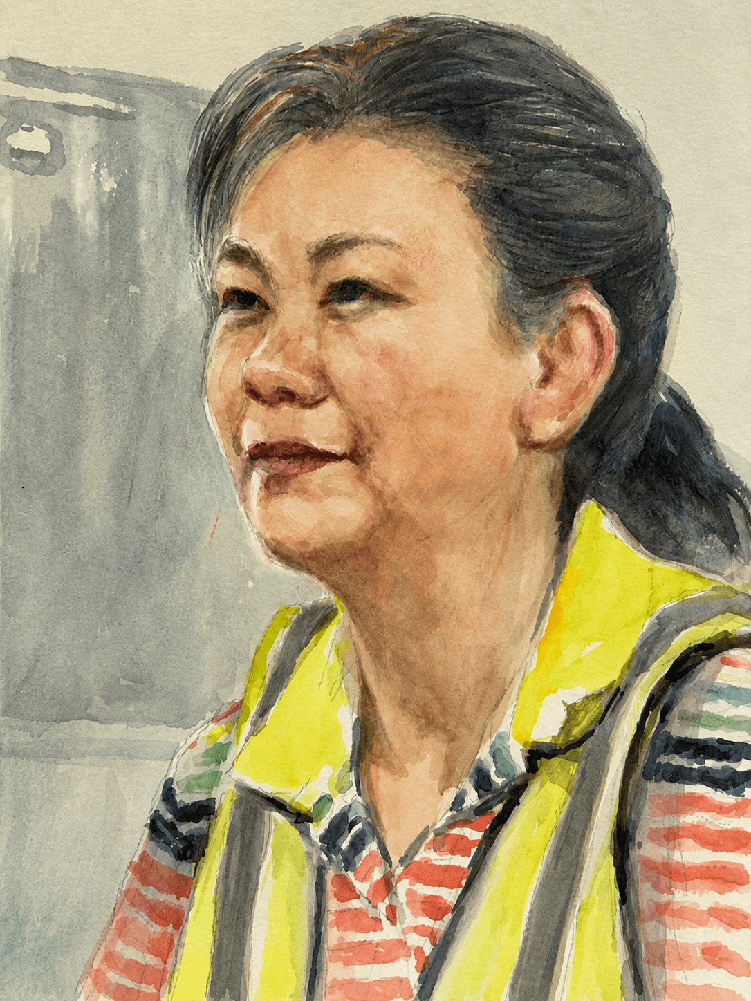 Woman in a yellow safety vest