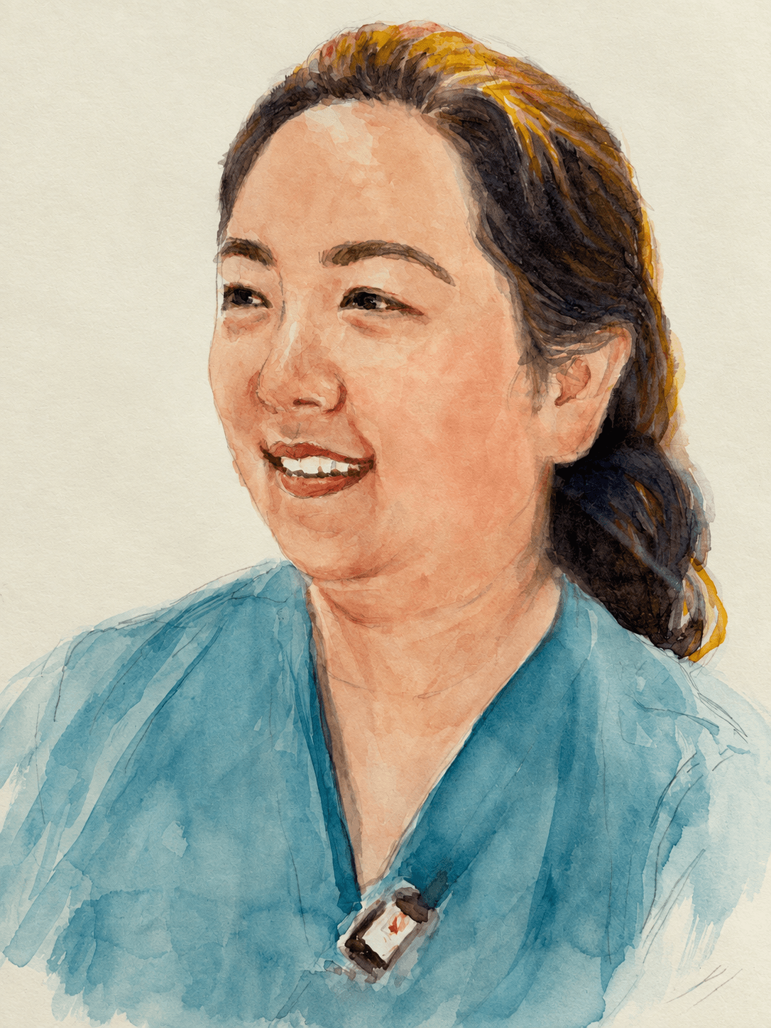 Smiling woman in teal