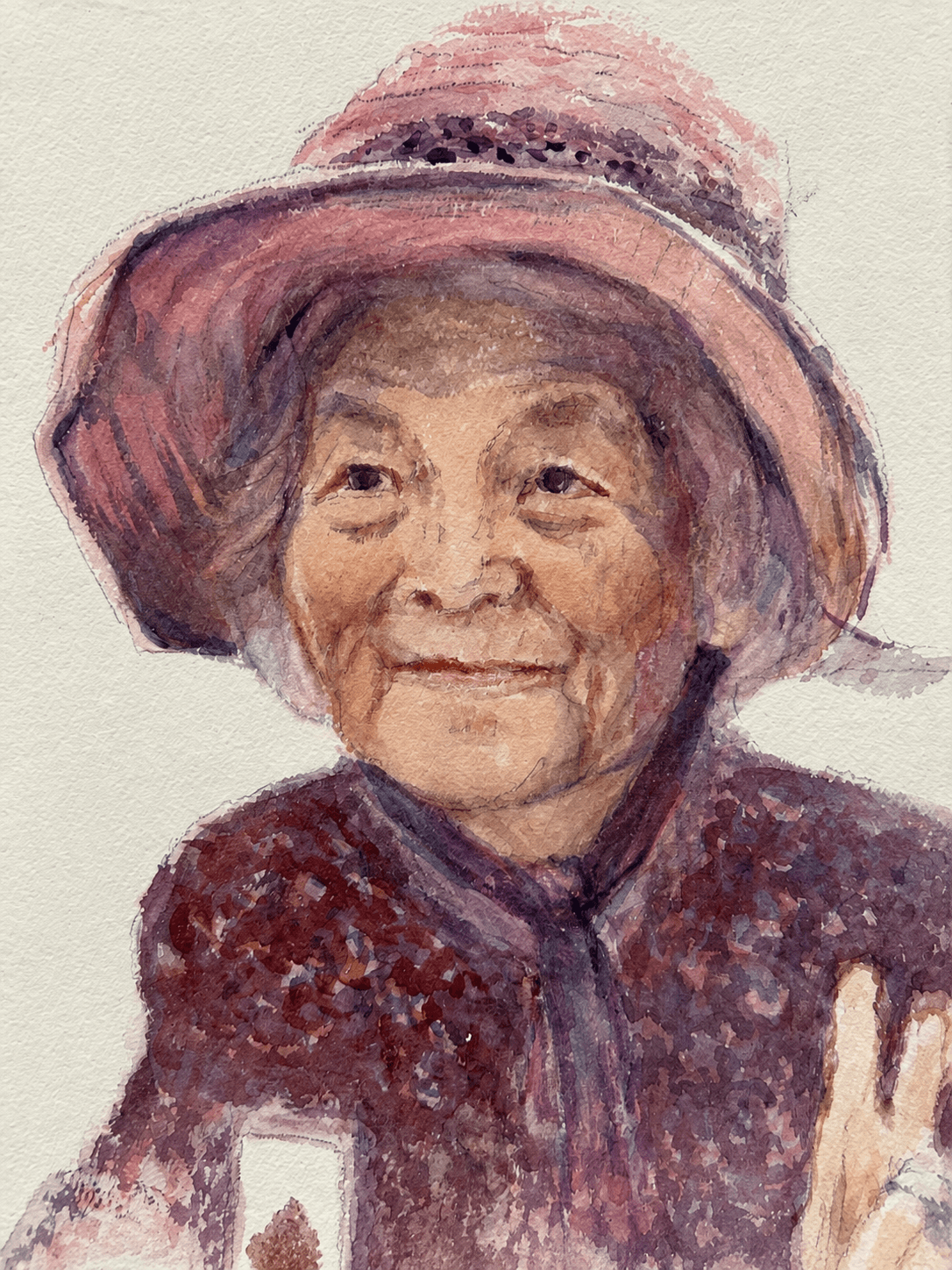 Elderly woman in pink hat