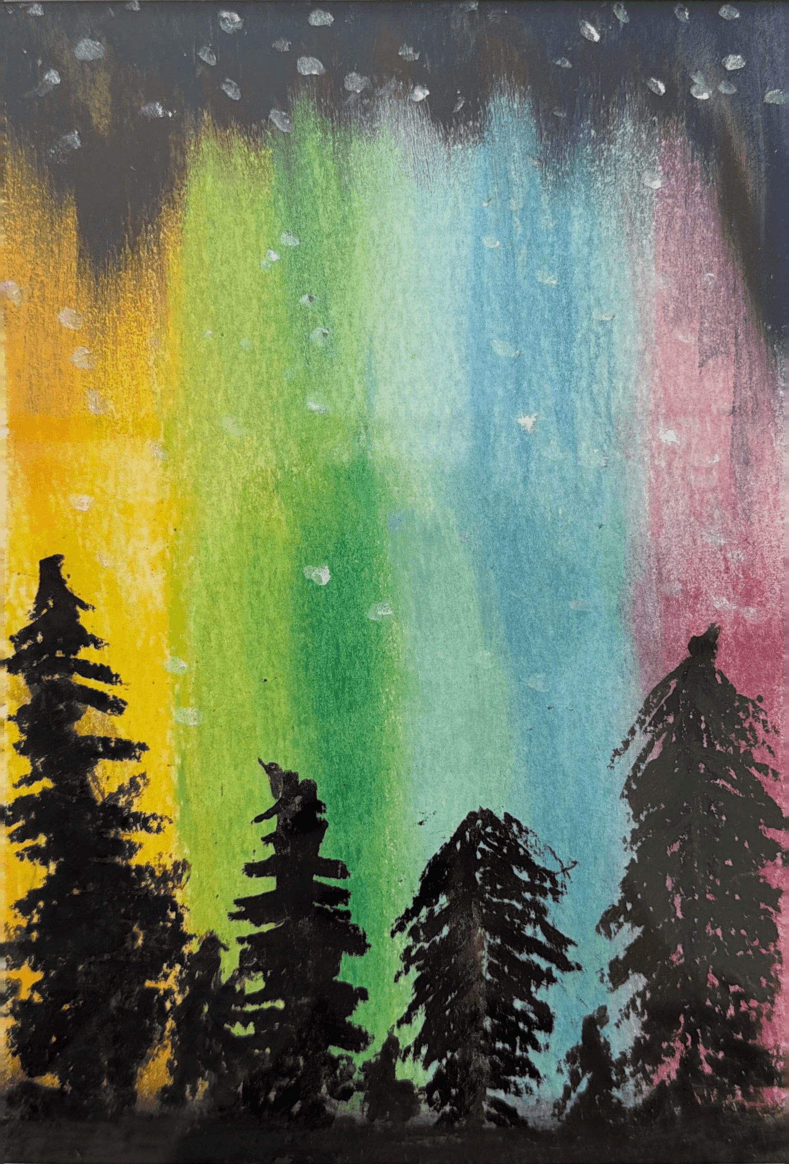 Rainbow aurora and white stars above four dark evergreen trees